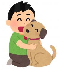 犬を抱きしめている人の画像