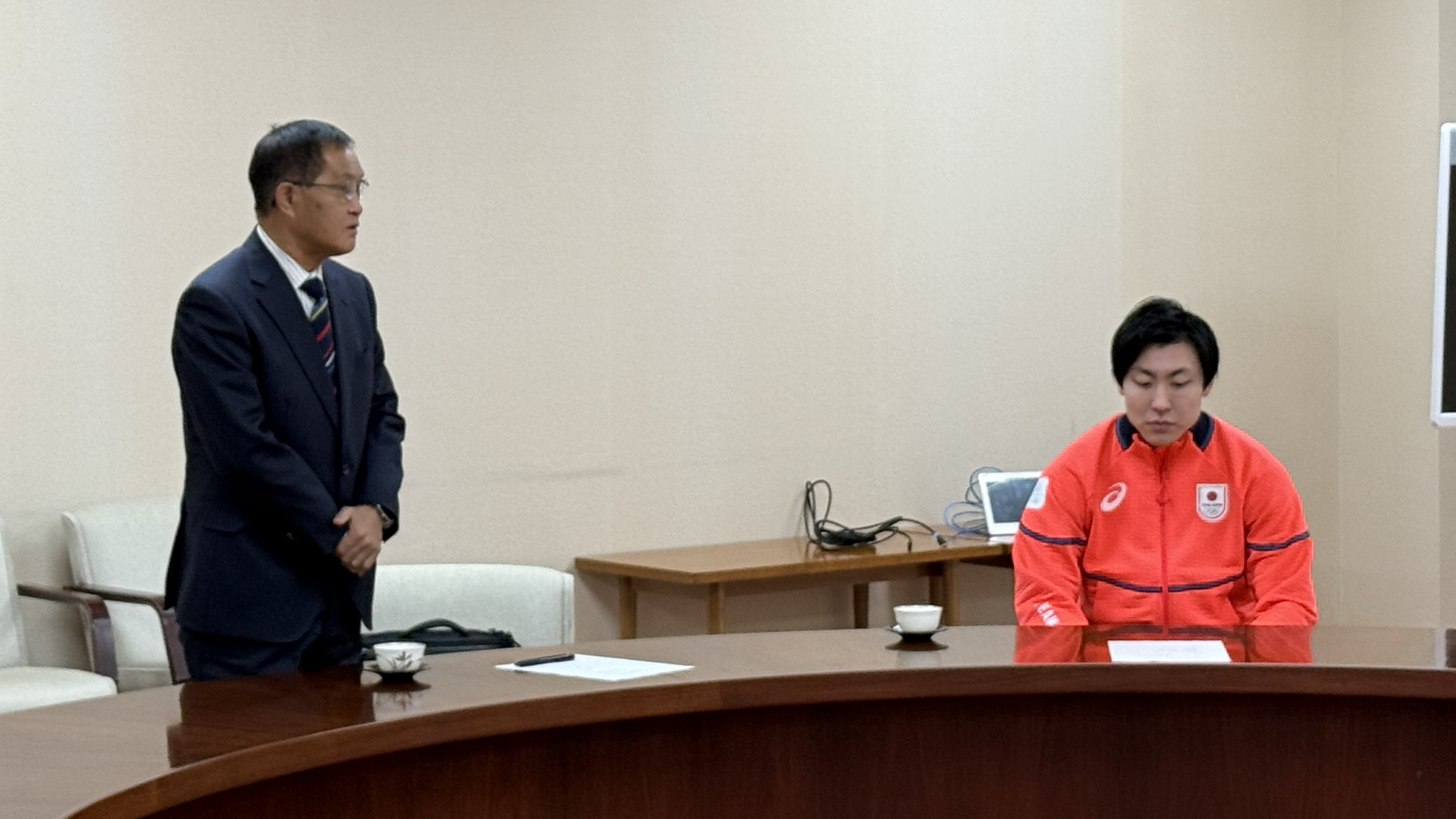 入澤監督からの報告の様子の写真